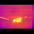 用蒸汽裂纹焦油制成的加热装置的红外图像，用激光退火，该激光器形成为MIT标志以证明该方法的可控性。